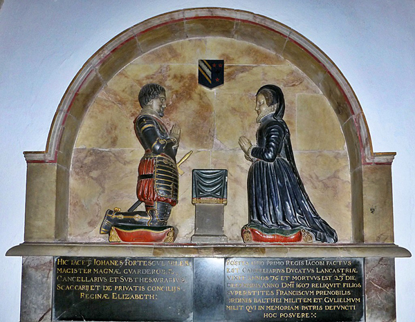 Tomb with kneeling man and woman